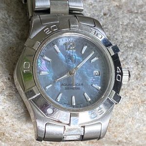 Tag Heuer watch with light blue mother of pearl  face